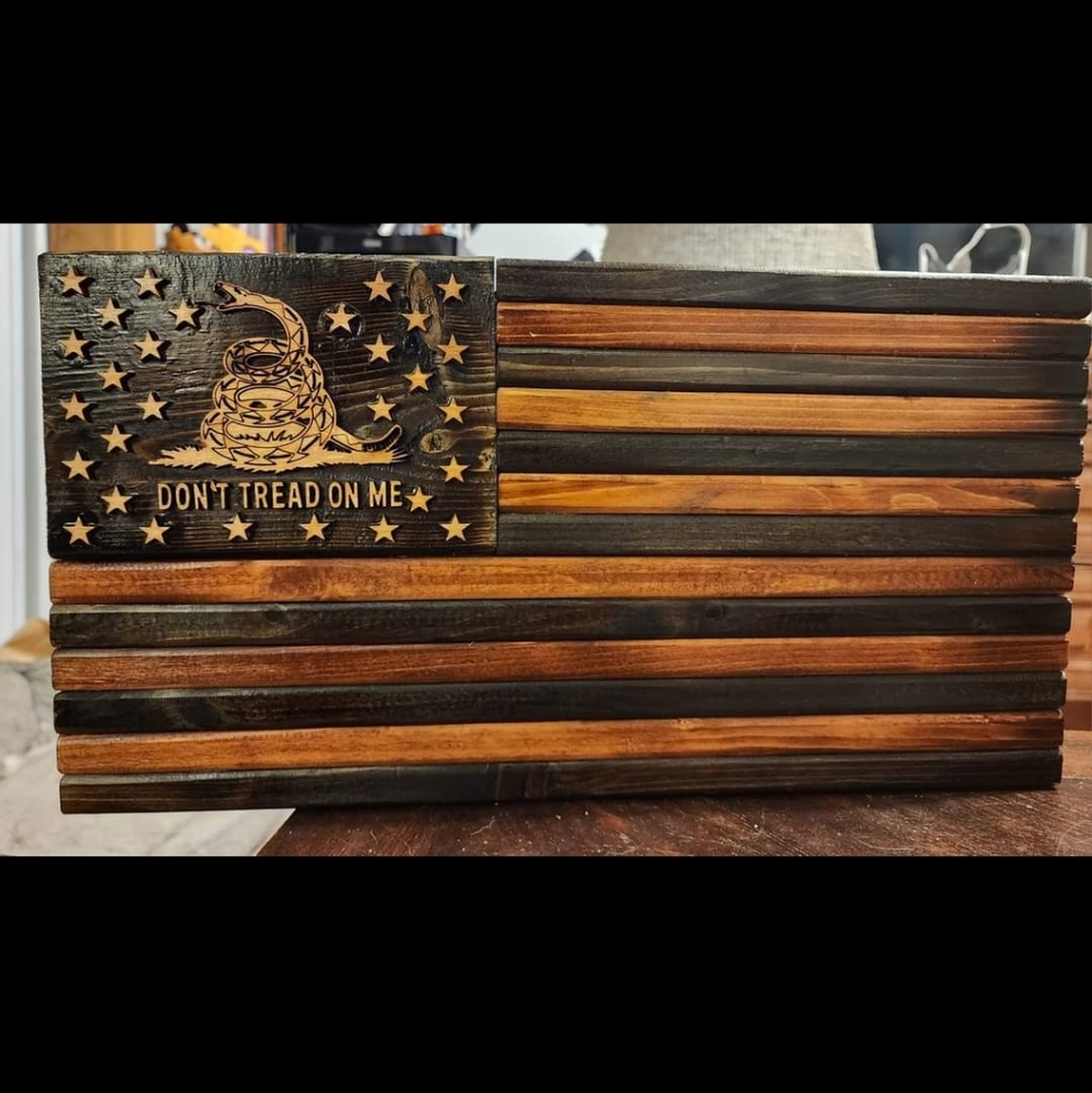 Hand carved and stained flag approx 24x12